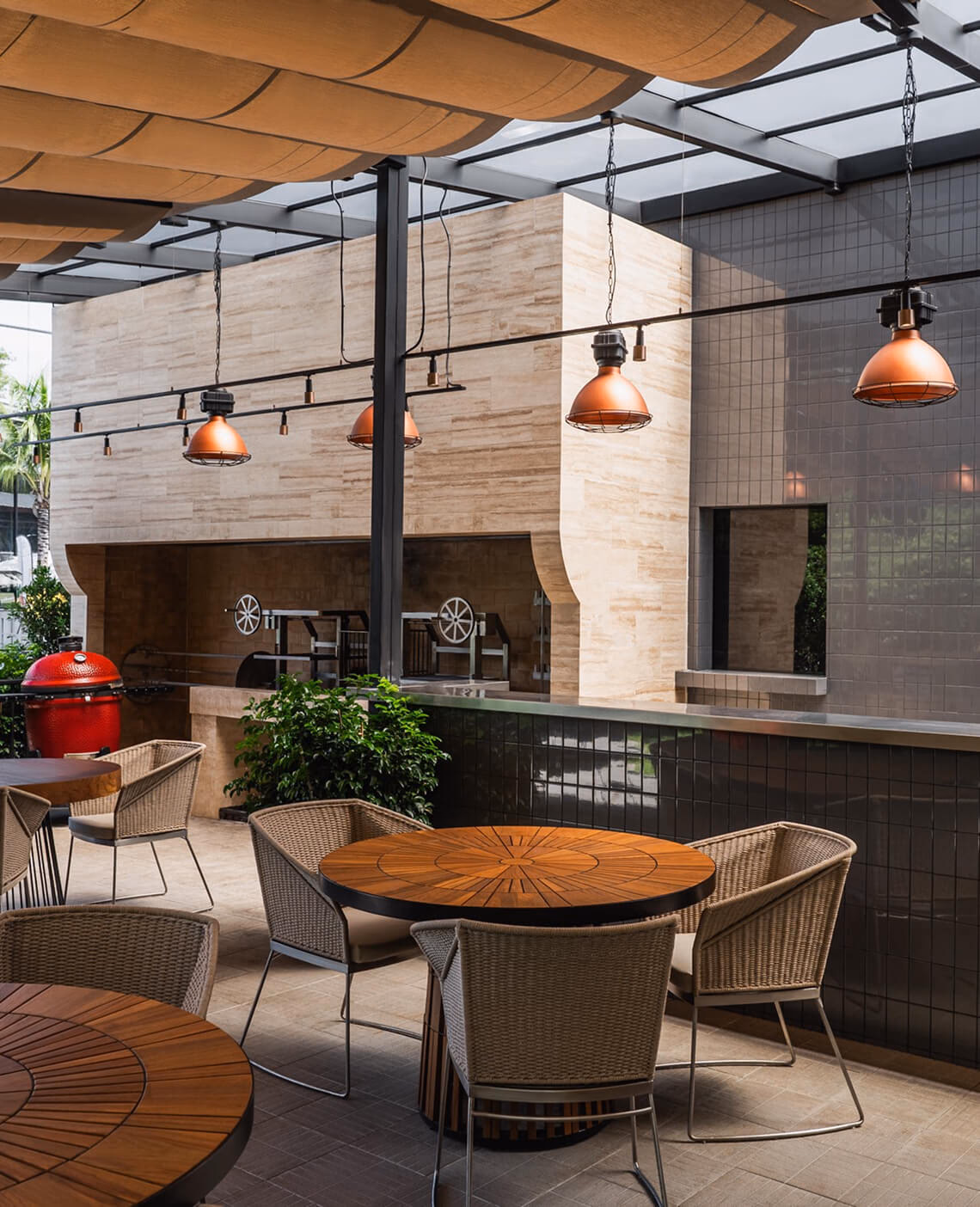 The open kitchen at Jonny Brisket under hanging lamps